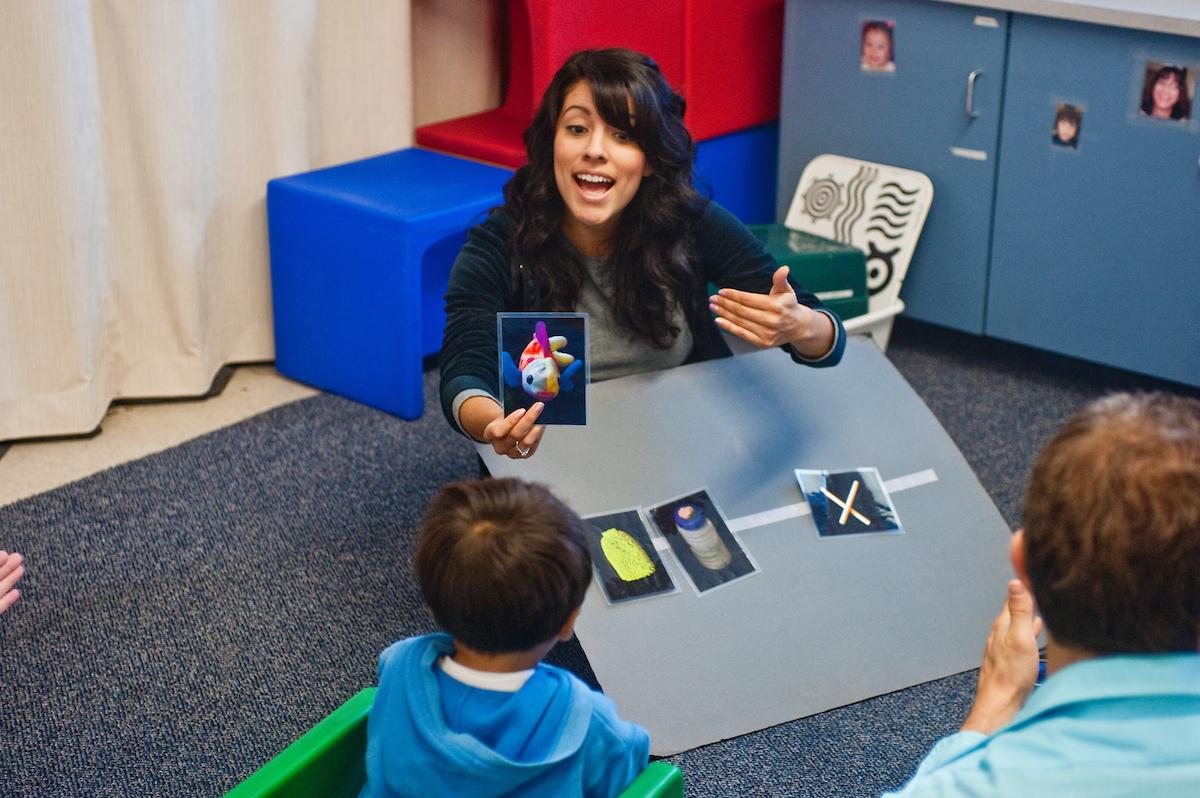 children in classroom with teacher